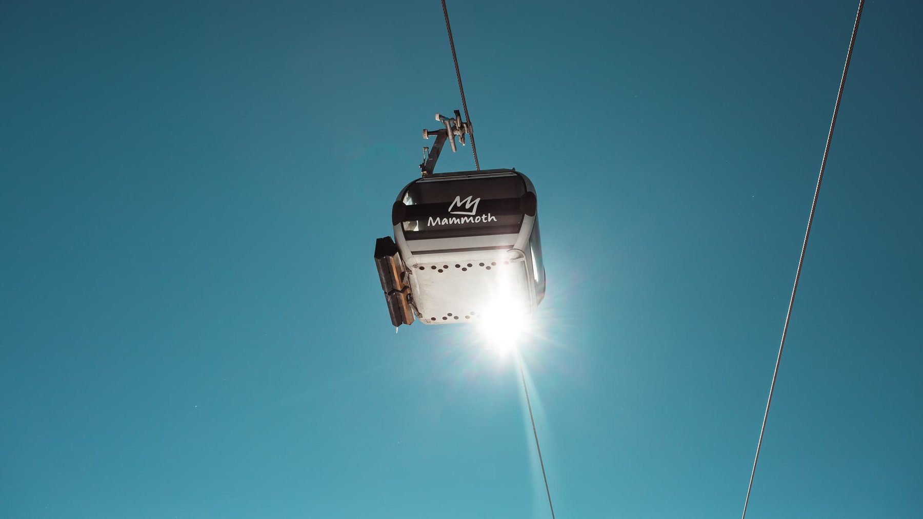 A gondola at Mammoth Mountain above the winter landscape